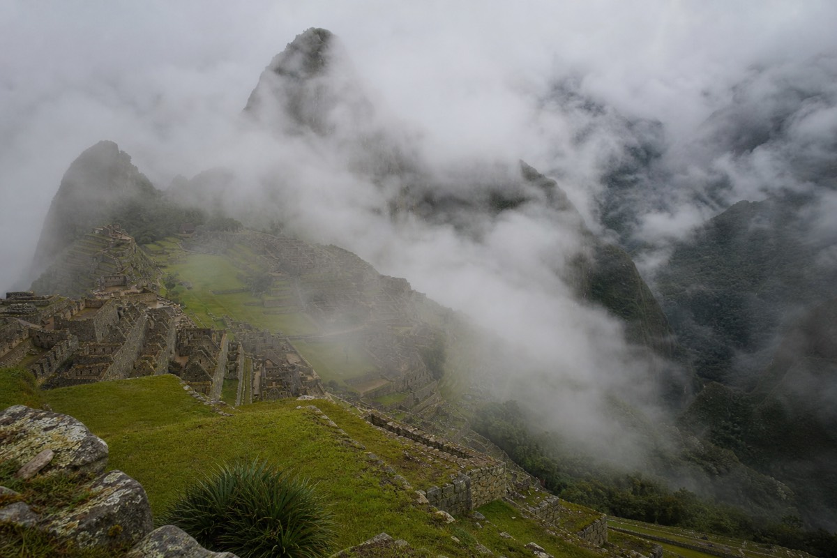 The Inca citadel in misty morning light, the sight a standard Machu Picchu tickets purchase covers