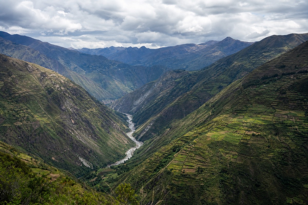 Anthony Bourdain in Peru took in sweeping views over a green valley toward distant mountains